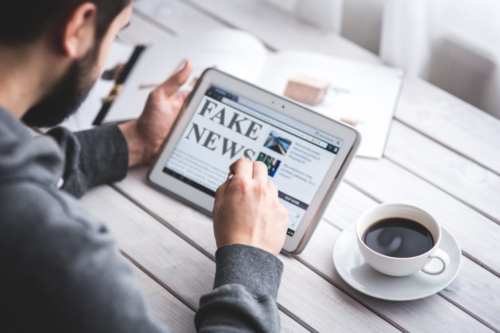 Computer Press Fake News Reading Hoax