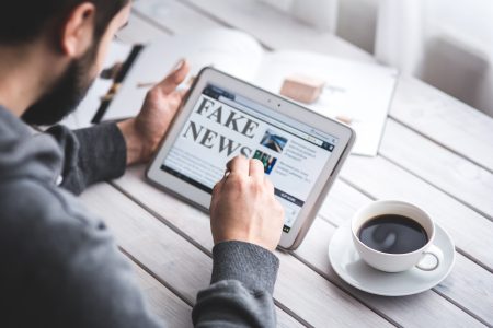 Computer Press Fake News Reading Hoax